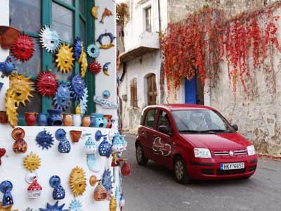 drive with your rental car through the pottery village of Margarites